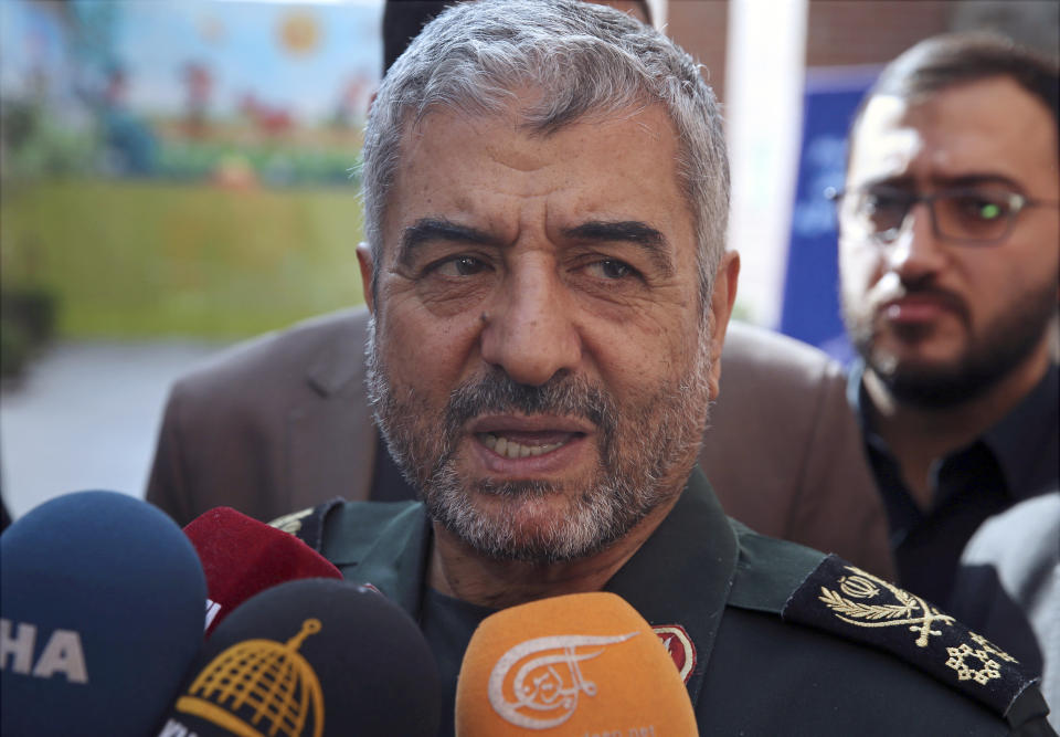 FILE - In this Oct. 31, 2017, file photo, the head of Iran's Revolutionary Guard Gen. Mohammad Ali Jafari speaks to journalists after his speech at a conference called "A World Without Terror," in Tehran, Iran. On Monday, April 8, 2019, the Trump administration designated Iran’s Revolutionary Guard a “foreign terrorist organization” in an unprecedented move against a national armed force. Iran’s Revolutionary Guard Corps went from being a domestic security force with origins in the 1979 Islamic Revolution to a transnational fighting force. (AP Photo/Vahid Salemi, File)