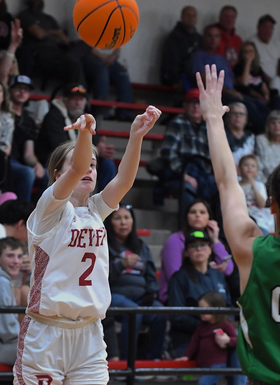 Dewey High School's senior Maci Rogers (2) shoots the ball during basketball action earlier in the season.