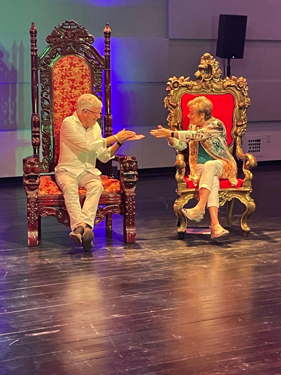 Michael Donald Edwards, left, and Linda DiGabriele applaud one another from prop thrones during a farewell party as they prepare to step down from leadership of Asolo Repertory Theatre.