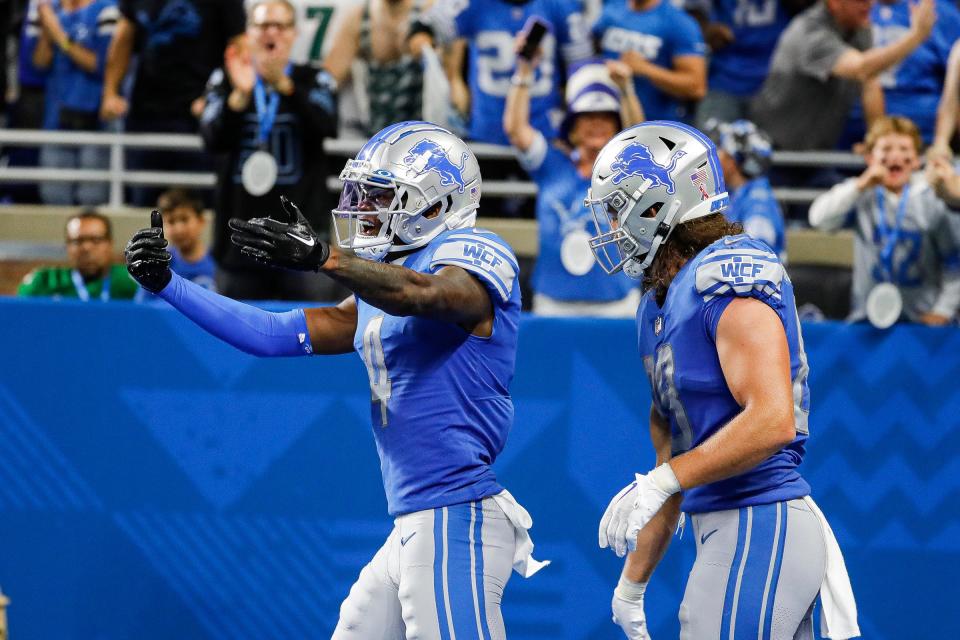 Detroit Lions wide receiver DJ Chark (4) reacts after scoring a touchdown against the Philadelphia Eagles during the second half at Ford Field, Sept. 11, 2022.
