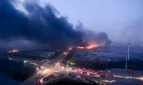 Fire and smoke can be seen on August 13, 2015 after massive explosions hit the Chinese city of Tianjin