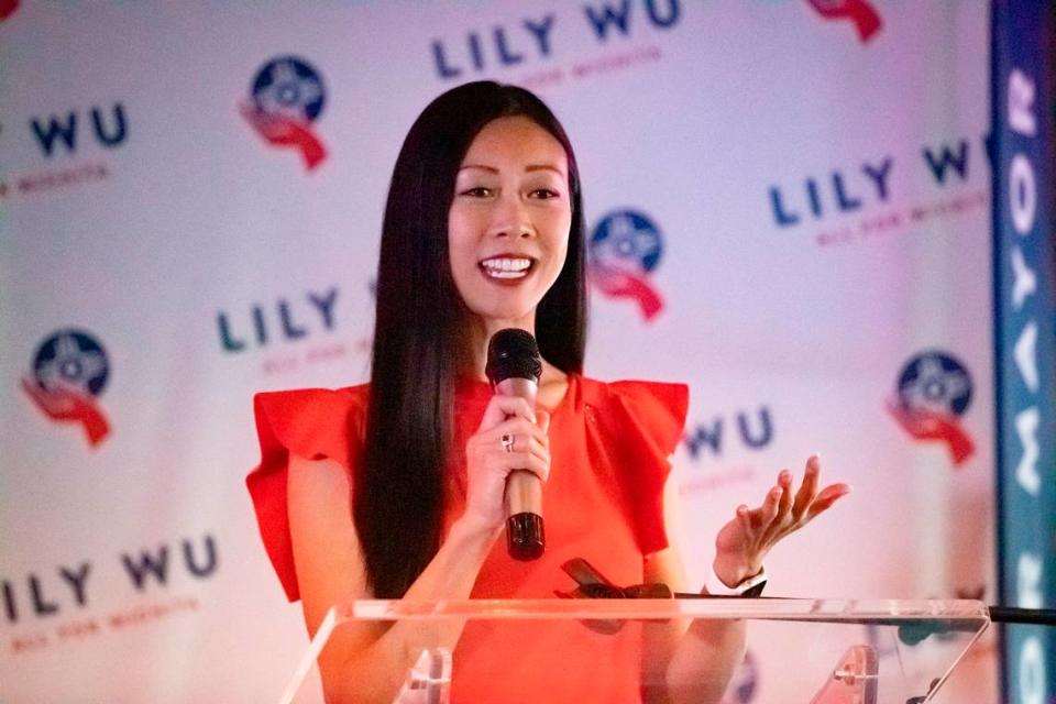 Lily Wu comes out to greet her supporters briefly at Dōma in Wichita on Tuesday night.