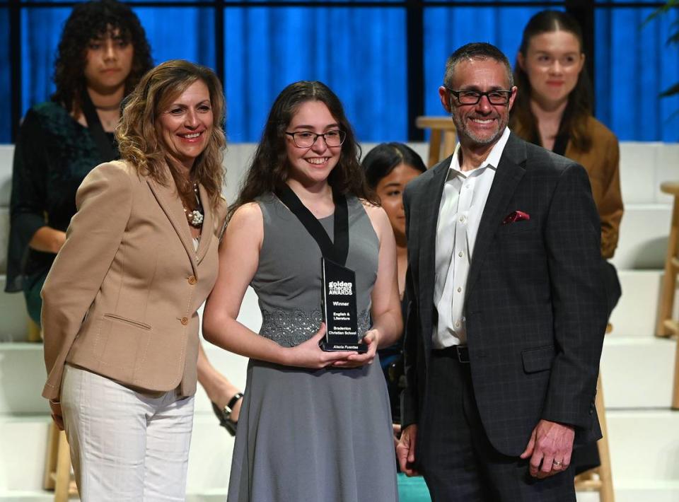 2023 Golden Herald Award winner in English and Literature Alexia Fuentes with presenters Jackie Barron and Tom McDougal Thursday night.