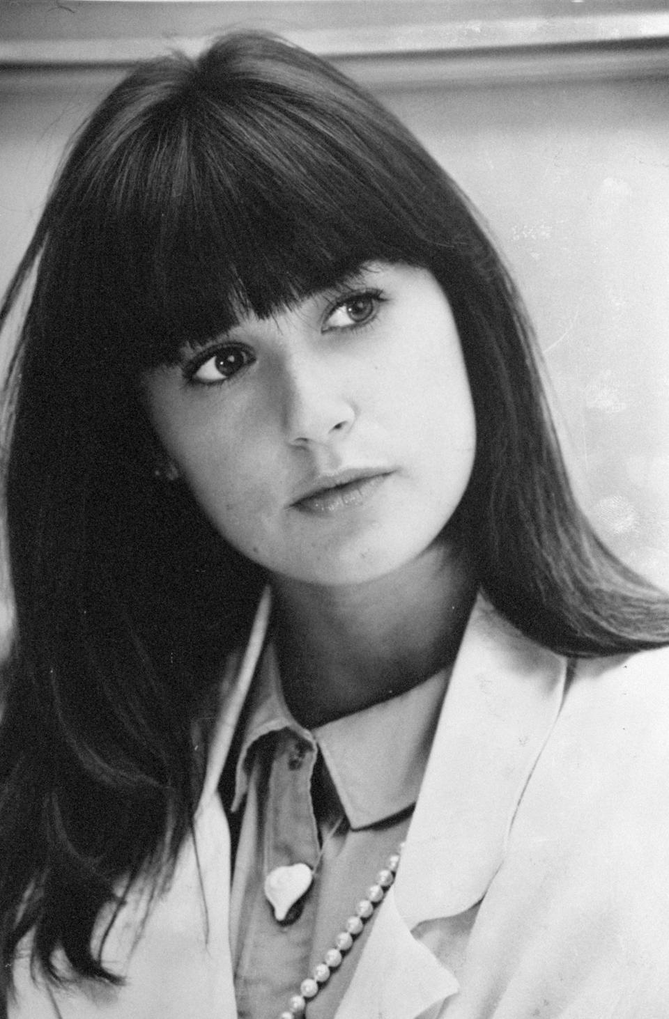 In honor of her 56th birthday, here is a look back at Demi Moore's best beauty moments, from her bowl cut to her shaved head.