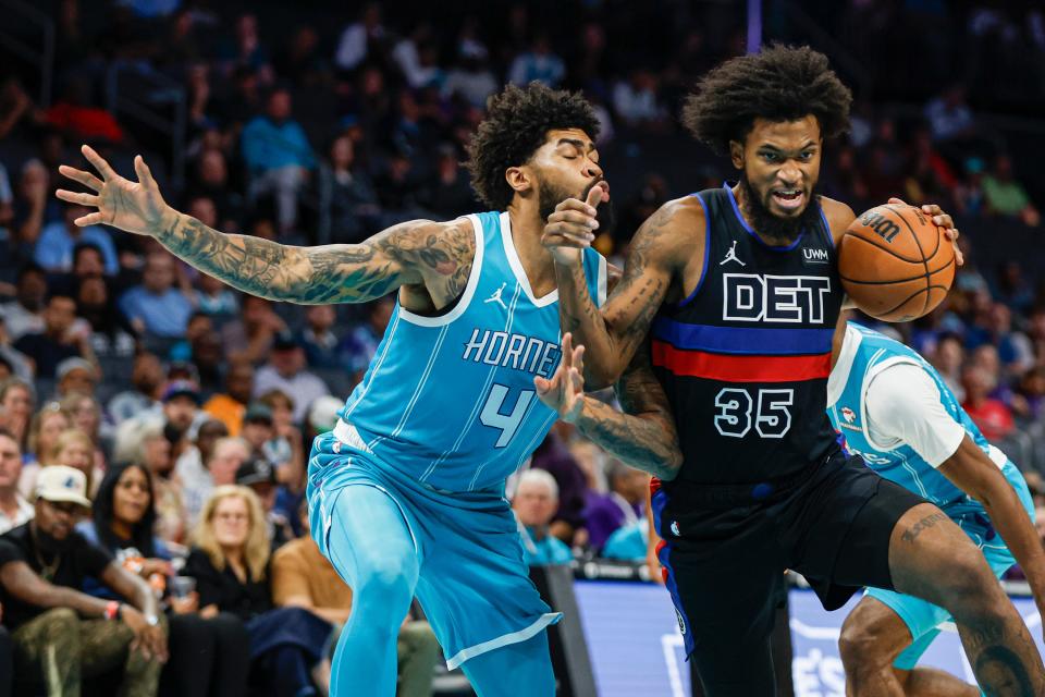 Detroit Pistons forward Marvin Bagley III (35) drives against Charlotte Hornets center Nick Richards (4) during the first quarter at the Spectrum Center in Charlotte, North Carolina, on Friday, Oct. 27, 2023.