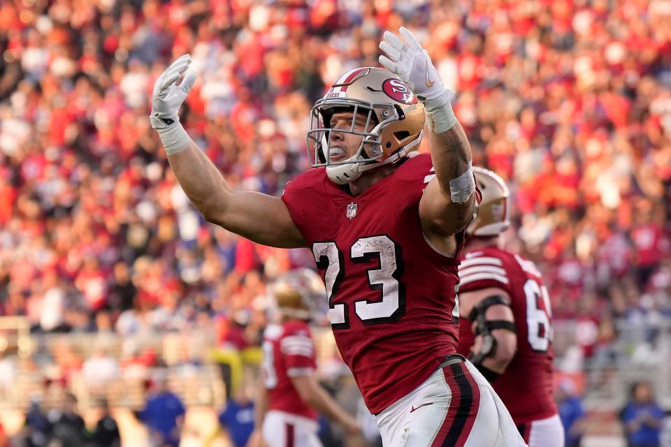 SANTA CLARA, CALIFORNIA - SEPTEMBER 21: Christian McCaffrey #23 of the San Francisco 49ers celebrates after scoring a touchdown against the New York Giants during the second quarter in the game at Levi's Stadium on September 21, 2023 in Santa Clara, California. (Photo by Thearon W. Henderson/Getty Images)