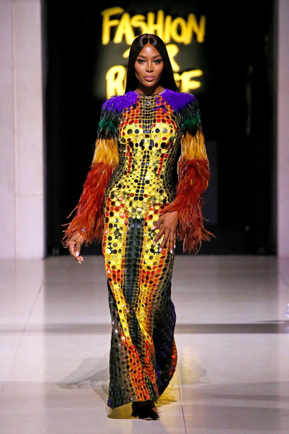 Naomi Campbell struts on the Fashion for Relief catwalk during London Fashion Week on Saturday.