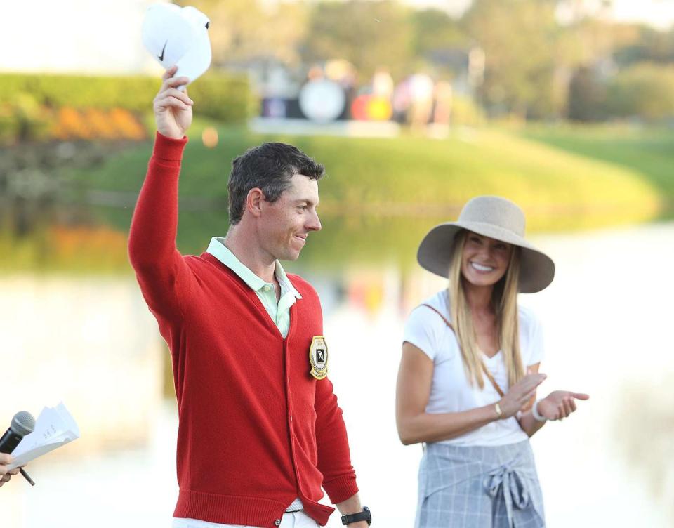 Rory McIlroy celebrates with wife Erica Stoll after winning the Arnold Palmer Invitational in Orlando, Fla
