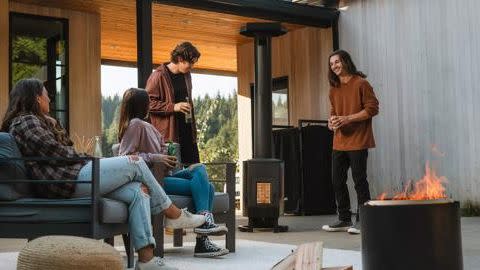 a group of people around a fire