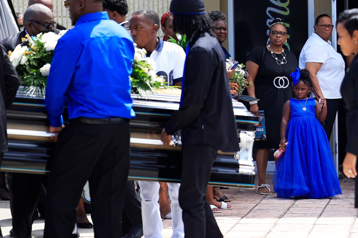 Je Asia, 4, looks on to the casket of her father, 29-year-old Jerrald De’Shaun Gallion, during funeral services Saturday, Sept. 9, 2023 at St. Paul Missionary Baptist Church of Jacksonville in Jacksonville, Fla. Gallion was one of three victims killed – Anolt Joseph "AJ" Laguerre Jr., 19, and Angela Michelle Carr, 52, being the others – in a racially-motivated shooting at the Dollar General on Kings Road on Aug. 26, 2023. It was announced over the pulpit an education scholarship will be set up for Je Asia.