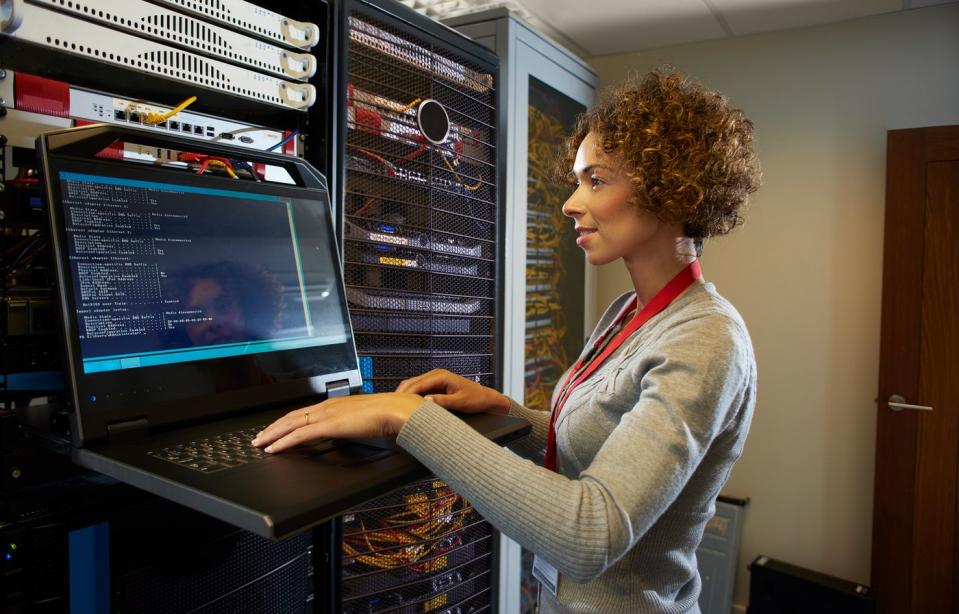 A person working in a data center