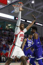 Ohio State forward E.J. Liddell (32) reacts after scoring against Seton Hall during the second half of an NCAA college basketball game Monday, Nov. 22, 2021, in Fort Myers, Fla. (AP Photo/Scott Audette)