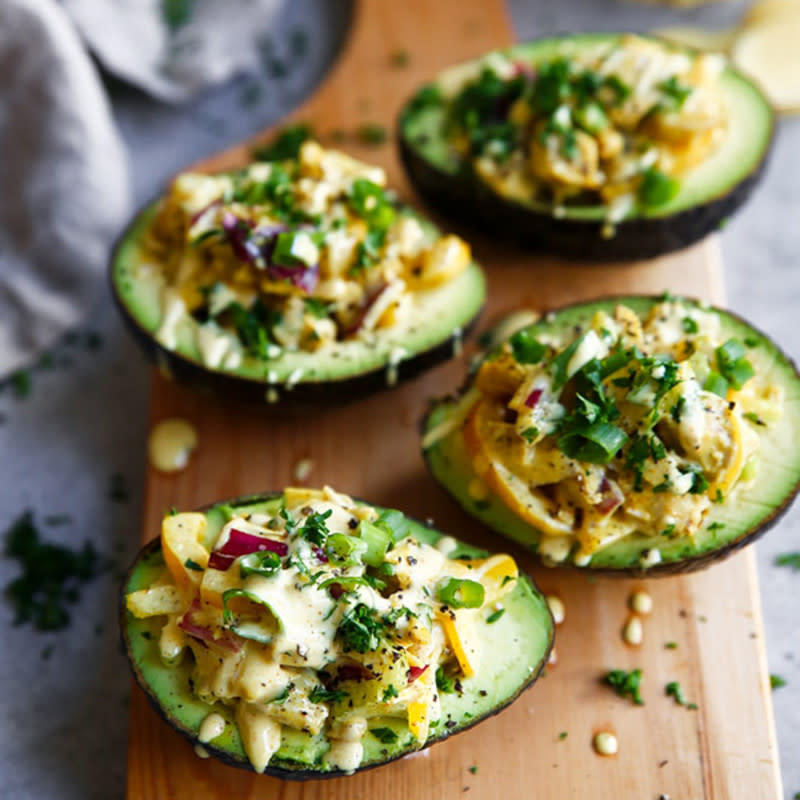 <p>The Movement Menu</p><p>Curried chicken and creamy avocado is a match made in heaven with these chicken salad boats!</p><p><strong>Get the recipe: <a href="https://themovementmenu.com/recipes/whole30-chicken-salad-boats/" rel="nofollow noopener" target="_blank" data-ylk="slk:Paleo Whole30 Chicken Salad Boats;elm:context_link;itc:0;sec:content-canvas" class="link rapid-noclick-resp">Paleo Whole30 Chicken Salad Boats</a></strong></p>