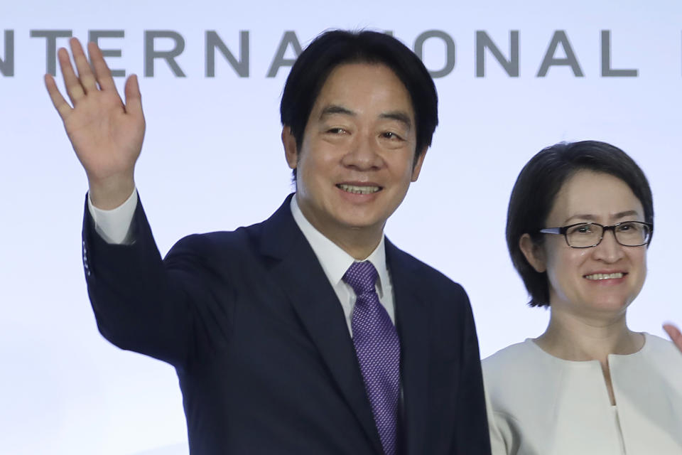 FILE - Taiwan Vice President and Democratic Progressive Party presidential candidate Lai Ching-te, who also goes by William, left, and his running mate Hsiao Bi-khim wave to the press during an international press conference in Taipei, Taiwan, on Jan. 9, 2024. Lai is currently Taiwan's vice president from the Democratic Progressive Party, which rejects China's sovereignty claims over the island. (AP Photo/Chiang Ying-ying, File)