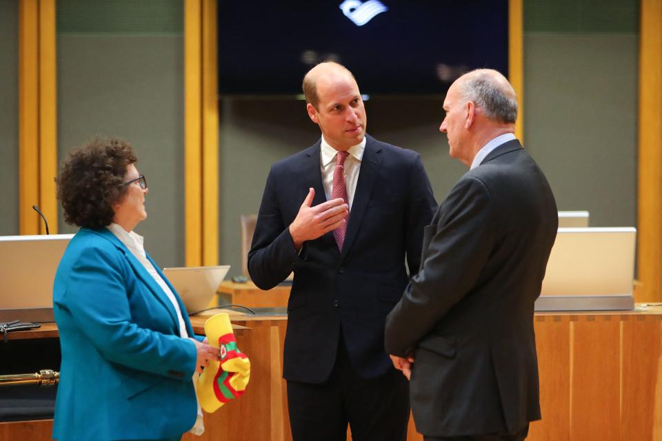 Britain's Prince William (C), Prince of Wales, speaks with Senedd members Elin Jones (L) and David Rees during a visit to the Chamber of the Senedd, the Welsh Parliament, in Cardiff on November 16, 2022. (Photo by Geoff Caddick / POOL / AFP) (Photo by GEOFF CADDICK/POOL/AFP via Getty Images)