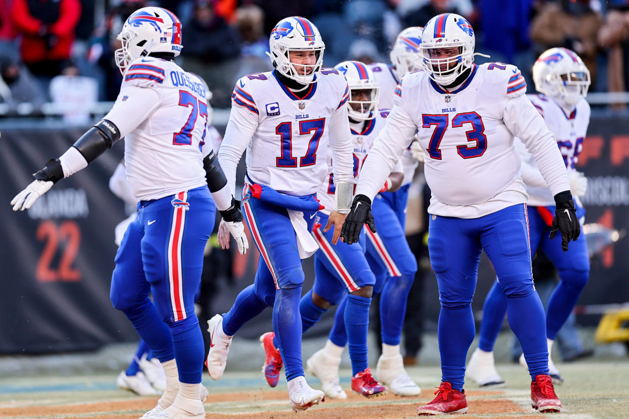 Buffalo Bills players celebrate a touchdown during the fourth quarter in the game against the Chicago Bears on Dec. 24, 2022, in Chicago. (Michael Reaves / Getty Images file)