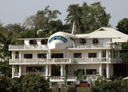 A house partially built in the shape of an airplane in Abuja, Nigeria. REUTERS/Goran Tomasevic