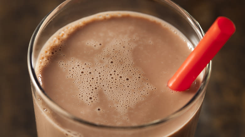 chocolate milk glass with straw