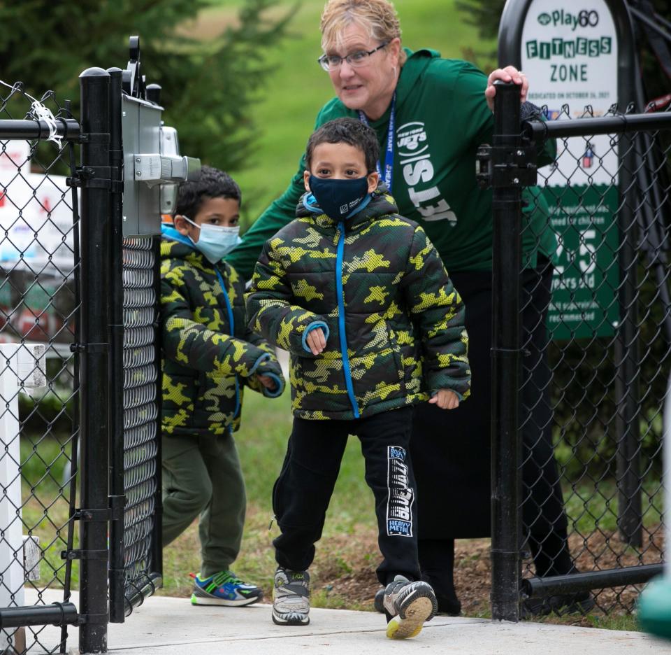 Head Start preschoolers run to the playground in Parsippany, New Jersey, in January. A new federal spending bill increased money for Head Start but left out other programs crucial for young families.