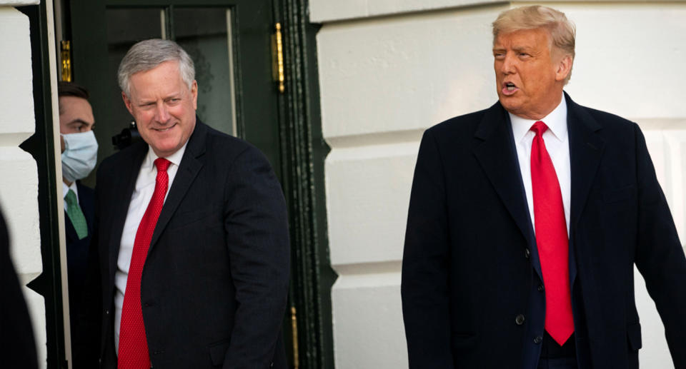 U.S. President Donald Trump departs with White House Chief of Staff Mark Meadows from the White House to travel to North Carolina for an election rally, in Washington, U.S. on October 21.