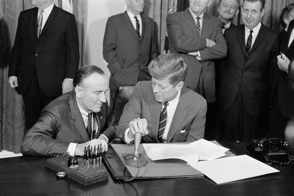 <div class="inline-image__caption"><p>President John F. Kennedy signs into law the second phase of a two-part program to address the problems of mental illness in 1963.</p></div> <div class="inline-image__credit">Bettmann/Getty Images</div>