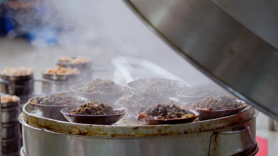 In this still taken from Season 2 of the series Once Upon a Bite, which debuted on Apr. 26, 2020, dishes of braised pork rice from Sichuan, China are being steamed.<span class="copyright">DOClabs Beijing</span>