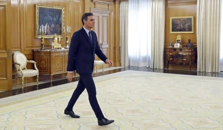 Spain's acting PM Sanchez arrives to meet King Felipe before their meeting in Madrid