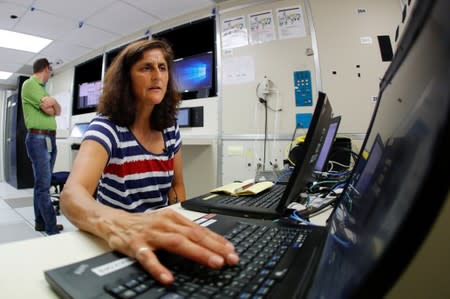 NASA commercial crew astronaut Sunita Williams runs a troubleshooting drill inside a mock ISS facility at the Johnson Space Center in Houston