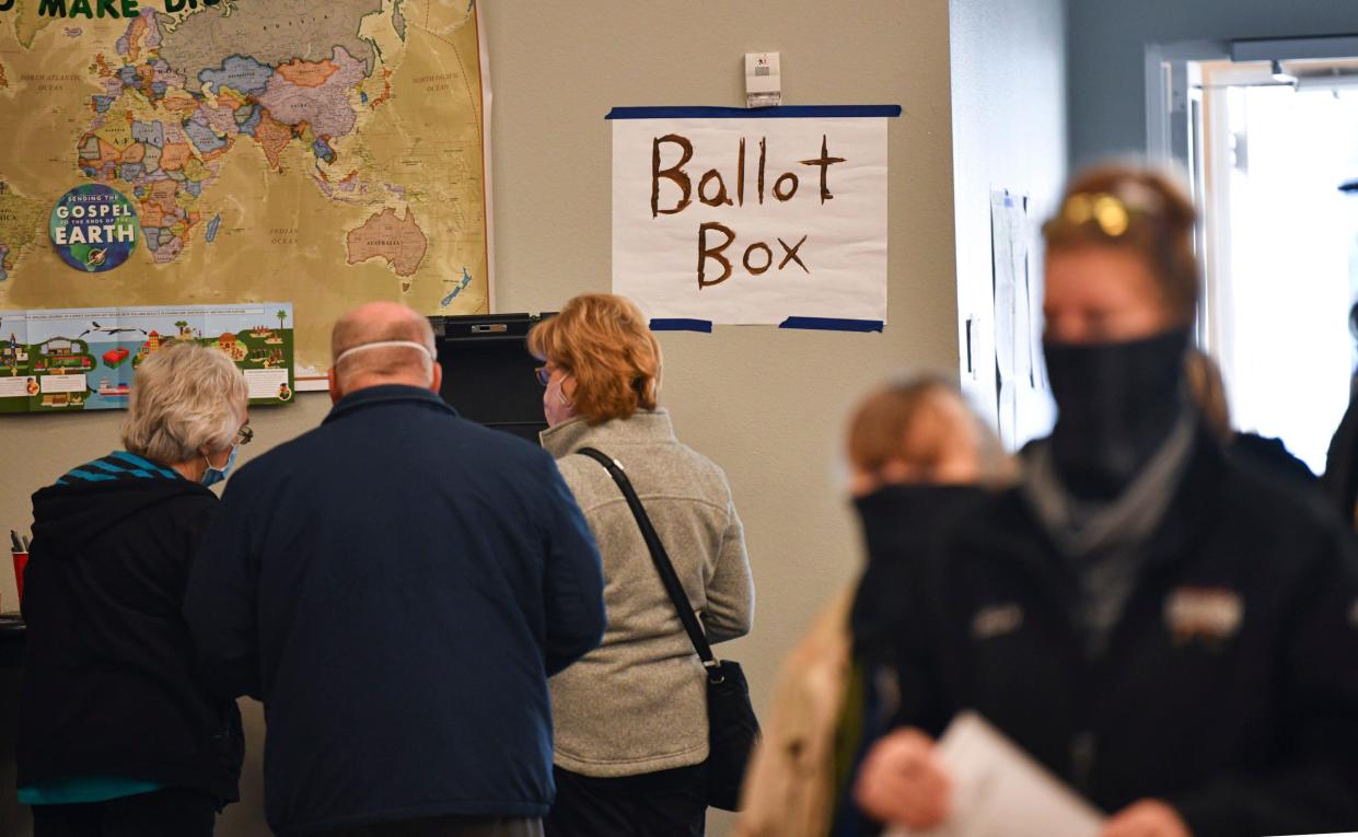 Voters cast their ballots Tuesday, Nov. 3, 2020, at Westwood Community Church in St. Cloud. 