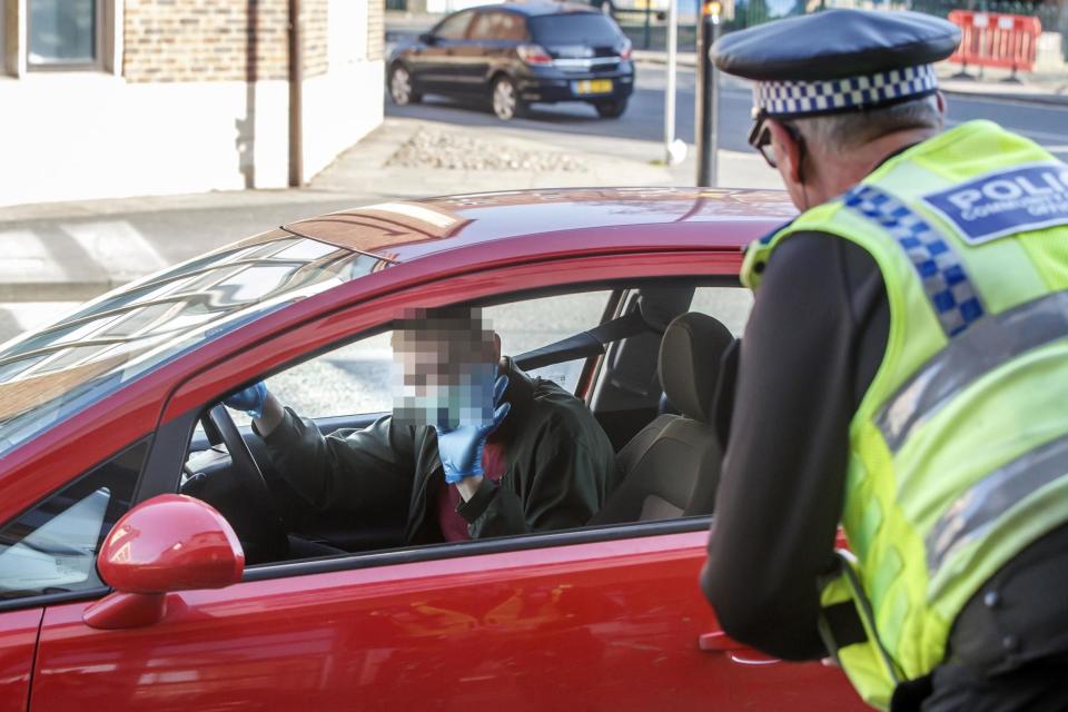 Police stopping vehicles in York to check if only essential journeys are being made (PA)