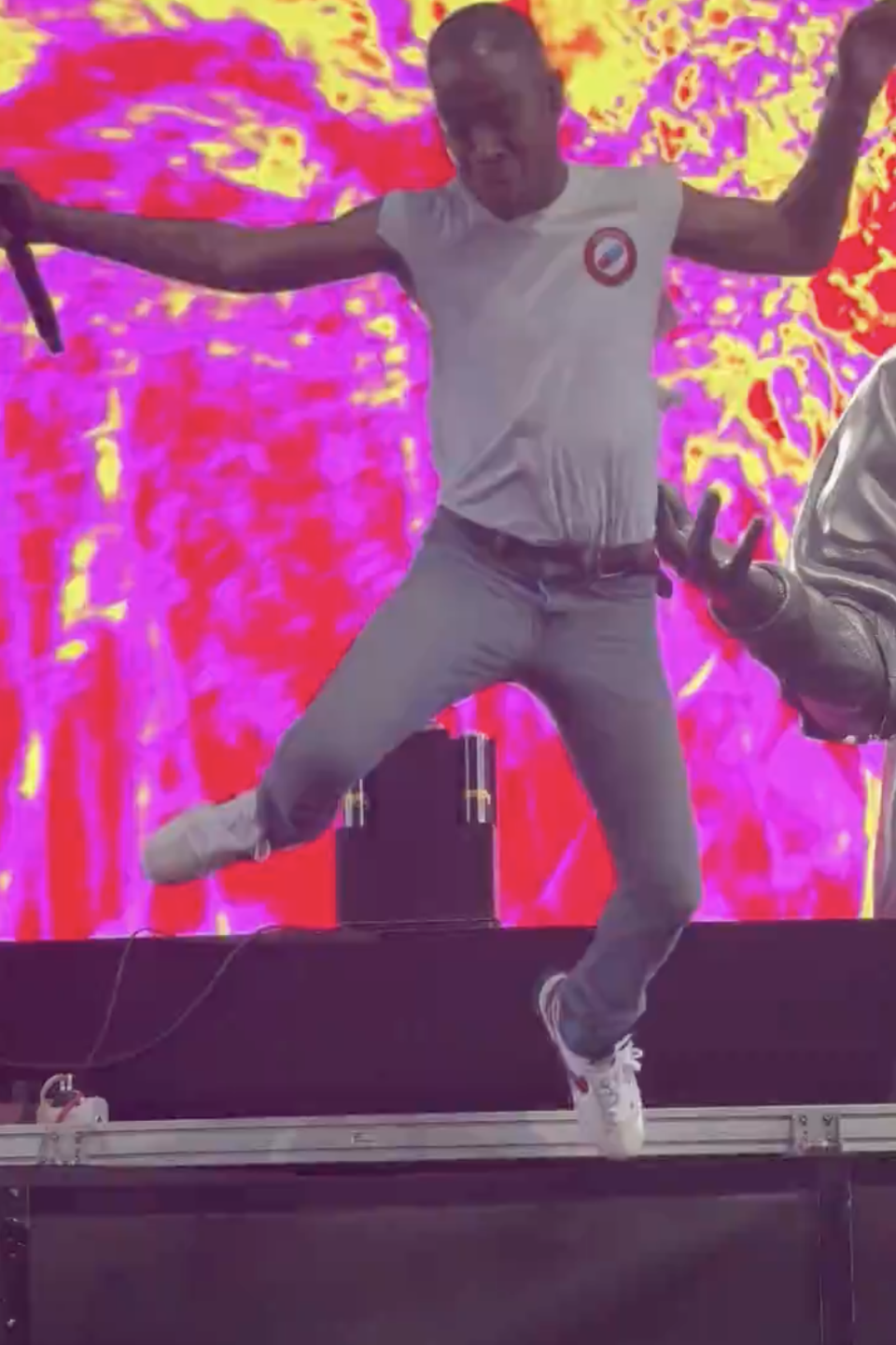 Screenshot of Kid Cudi jumping from the stage at Coachella