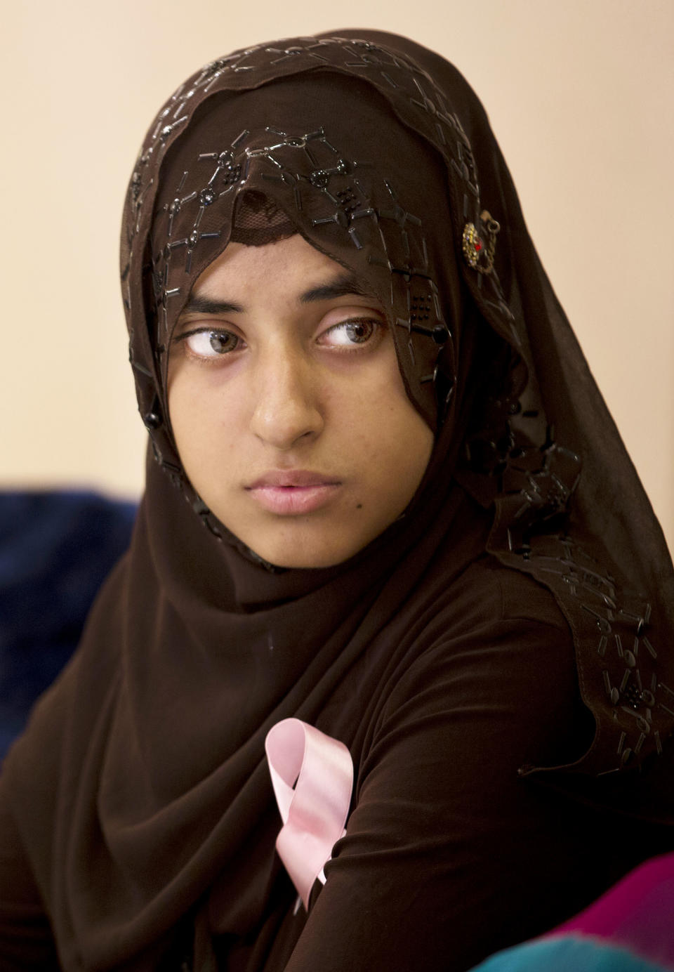 In this Wednesday, Oct. 30, 2013 photo, a Pakistani student listens to a lecture organized by the breast cancer awareness group PinkRibbon in Islamabad, Pakistan. One in nine women in Pakistan will face breast cancer during their life, with the country itself having the highest rate of the disease across Asia, according to the breast cancer awareness group PinkRibbon, oncologists and other aid groups. Yet discussing it remains taboo in a conservative, Islamic culture where the word breast is associated with sexuality instead of health and many view it as immoral for women to go to the hospital for screenings or discuss it even within their family. (AP Photo/B.K. Bangash)