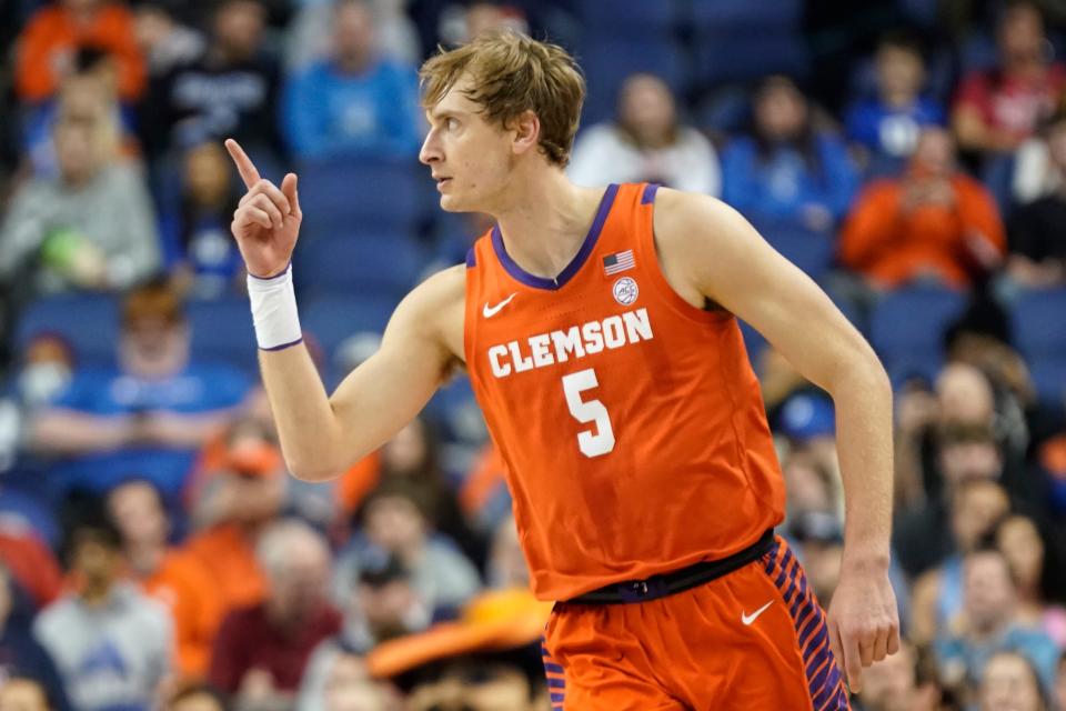 Clemson forward Hunter Tyson (5) reacts after making a 3-point basket against Virginia during the first half of an NCAA college basketball game at the Atlantic Coast Conference Tournament in Greensboro, N.C., Friday, March 10, 2023. (AP Photo/Chuck Burton)