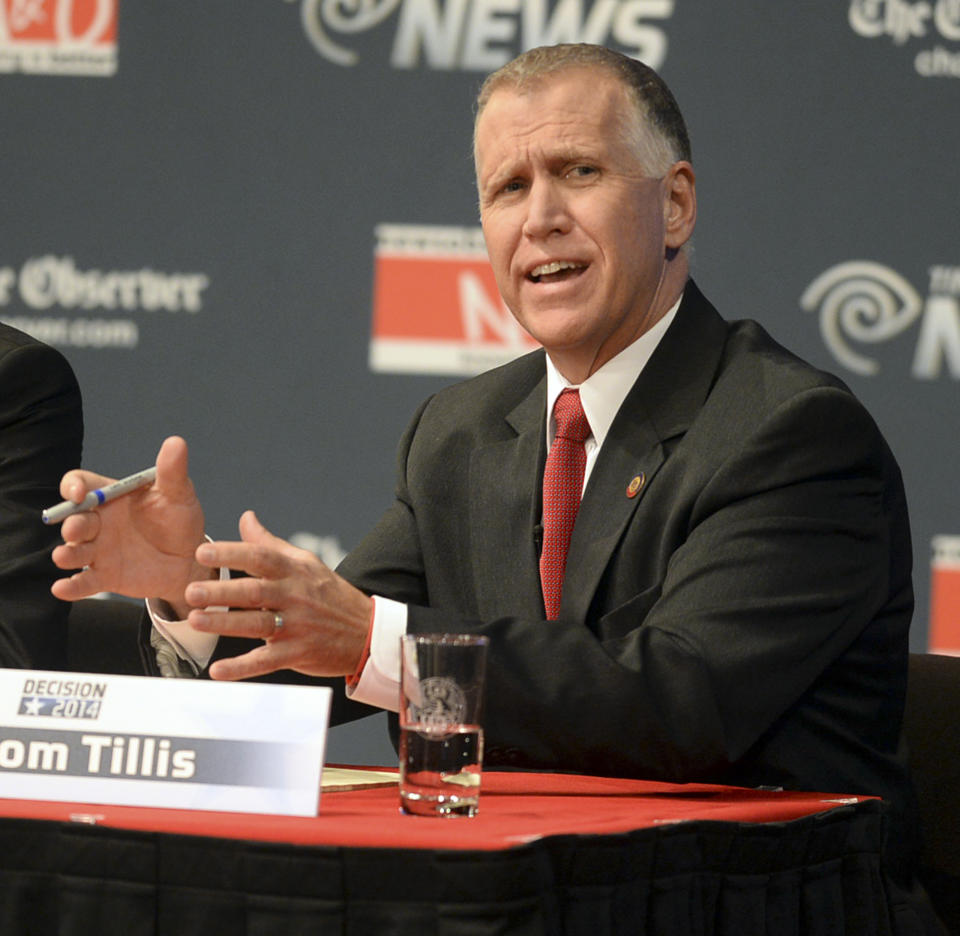 Republican senatorial candidate Thom Tillis answers a question during a debate at Davidson College in Davidson, N.C., Tuesday, April 22, 2014. (AP Photo/Charlotte Observer, Todd Sumlin, Pool)