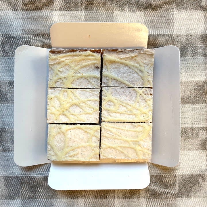 An opened container of frozen Iced Gingerbread Squares