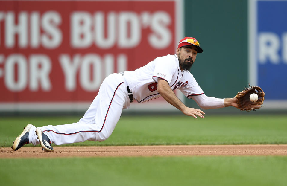 FILE - In this Sept. 1, 2019, file photo, Washington Nationals third baseman Anthony Rendon makes a catch on a line drive by Miami Marlins' Miguel Rojas during the seventh inning of a baseball game in Washington. Rendon is another NL contender for MVP. He emerged as the Nationals fought their way to the postseason after a poor start. The voting is done before the playoffs, so Rendon’s postseason won’t be a factor, but he’d already done plenty before that. (AP Photo/Nick Wass, File)