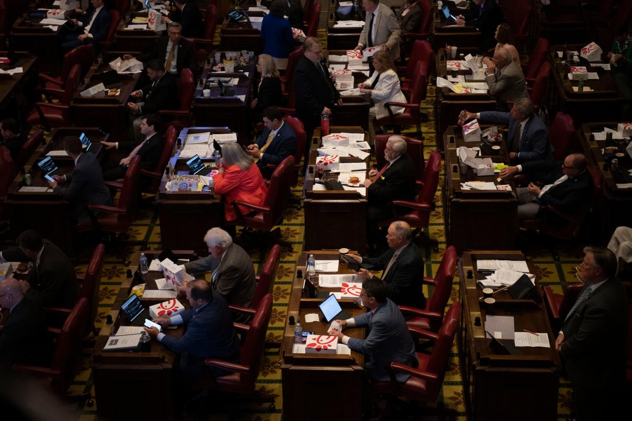 Tennessee House members gather in their chamber for a floor session on April 23.