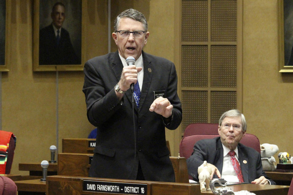 FILE - Republican state Sen. David Farnsworth urges members to reject a move to adjourn the legislative session as GOP Sen. Vince Leach looks on at the state Capitol in Phoenix, Friday, May 8, 2020. Donald Trump on Wednesday, June 29, 2022, endorsed Farnsworth, the Republican running against Arizona House Speaker Rusty Bowers, who last week gave powerful testimony to the House committee investigating the Jan. 6 insurrection. (AP Photo/Bob Christie,File)