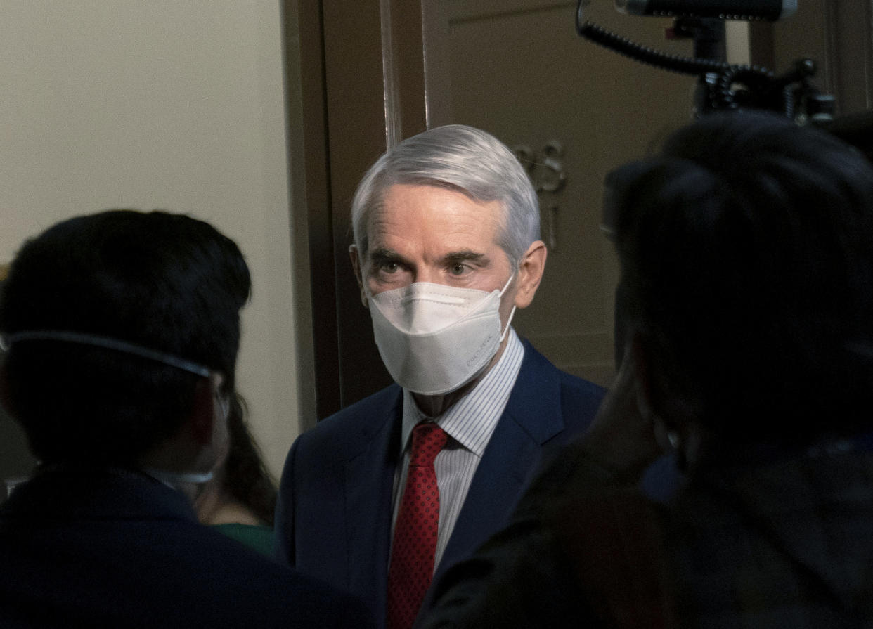 FILE - In this Jan. 19, 2021 file photo, Sen. Rob Portman, R-Ohio, speaks to members of the media outside a Senate Finance Committee hearing on Capitol Hill in Washington. Portman said Monday, Jan. 25 that he won&#39;t seek reelection and plans to end a career in federal government spanning more than three decades. (AP Photo/Andrew Harnik, File)