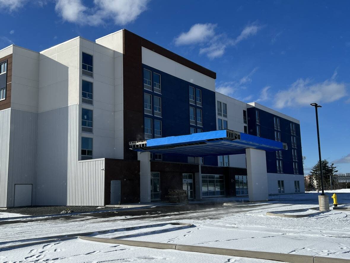 The Nova Scotia government purchased this unfinished hotel in Bedford, N.S., for $34 million to convert it into a transitional health-care unit. The goal is to use it for patients who no longer need a hospital bed, but aren't well enough to go home. (Paul Poirier/CBC - image credit)