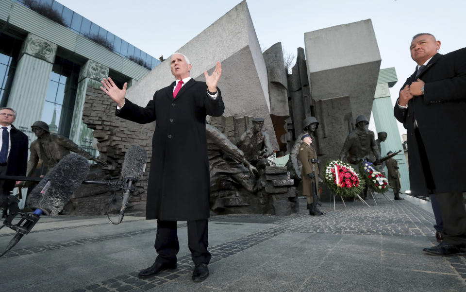 United States Vice President Mike Pence speaks during a statement in front of the 'Warsaw Uprising Monument' in Warsaw, Poland, Thursday, Feb. 14, 2019. The Polish capital is host for a two-day international conference on the Middle East, co-organized by Poland and the United States. (AP Photo/Michael Sohn)