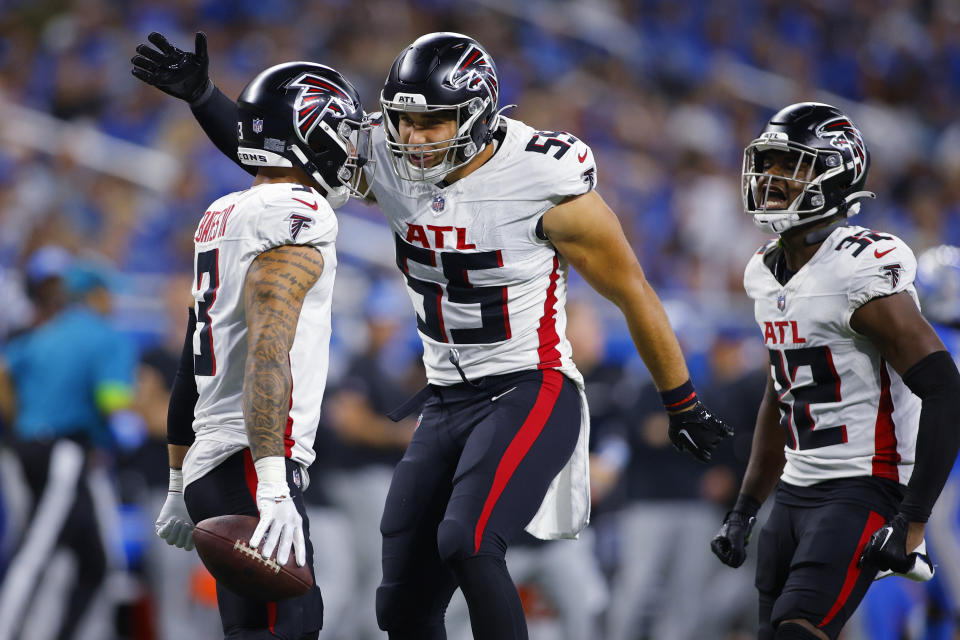 Atlanta Falcons safety Jessie Bates III (3) is congratulated by linebacker Kaden Elliss (55) after Bates intercepted a pass against the Detroit Lions in the second half of an NFL football game, Sunday, Sept. 24, 2023, in Detroit. (AP Photo/Al Goldis)