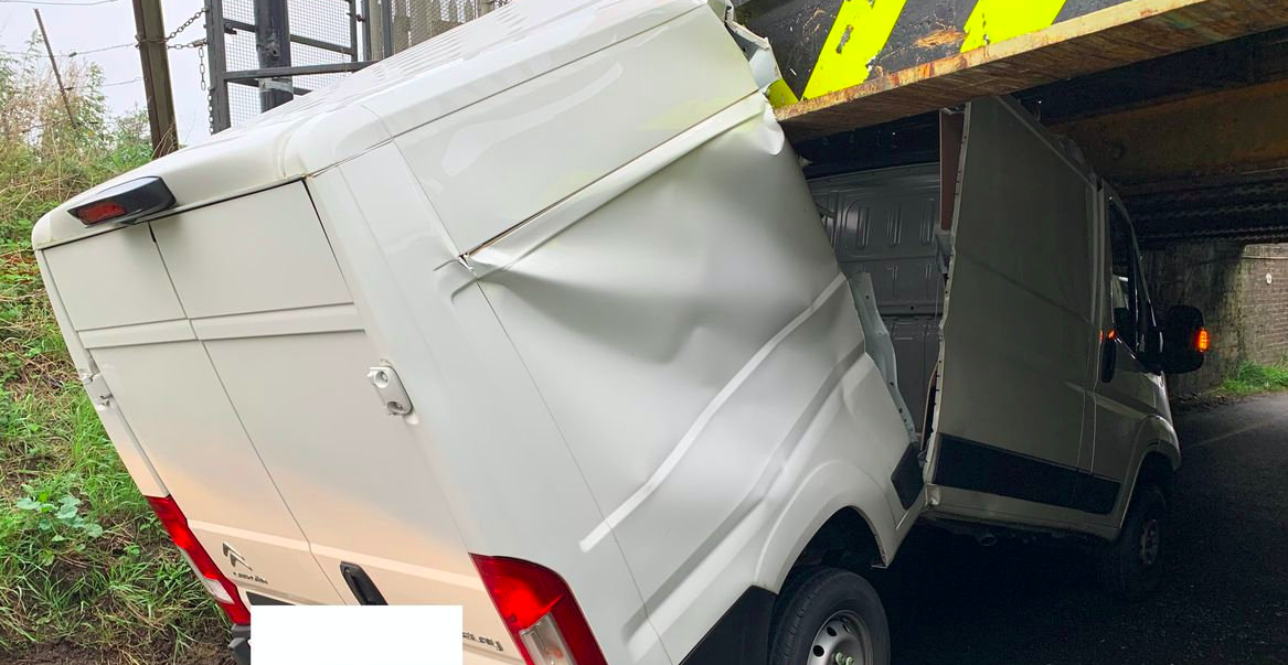 The van split in half as it hit the Stonea Railway Bridge (SWNS)