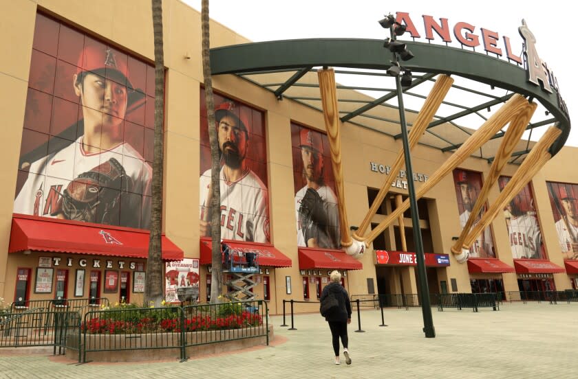 ANAHEIM, CA - MAY 23, 2022 - - A fan goes to buy tickets at the main entrance to Angel Stadium.