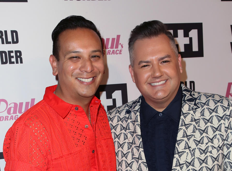 Close-up of Salvador and Ross smiling at a media event