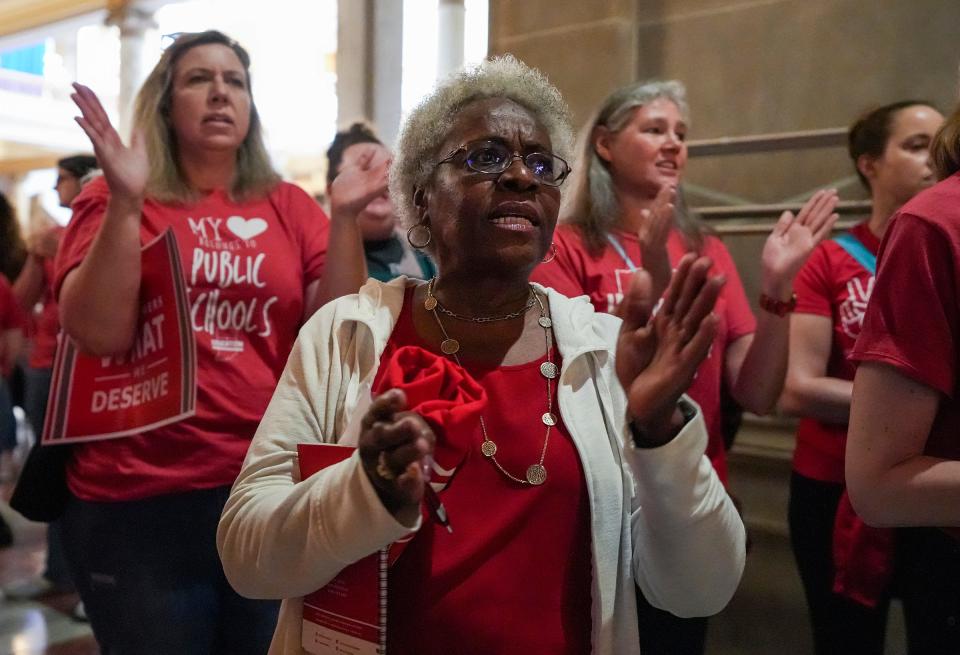 Johnnie Fick, a teacher for Wawasee Community School Corporation, rallies at the Indiana Statehouse on Thursday, April 13, 2023, in Indianapolis. Teachers called for more public school funding and spoke in opposition to a bill that would remove many discussion topics from the collective bargaining process, as well as "culture war and book banning bills."