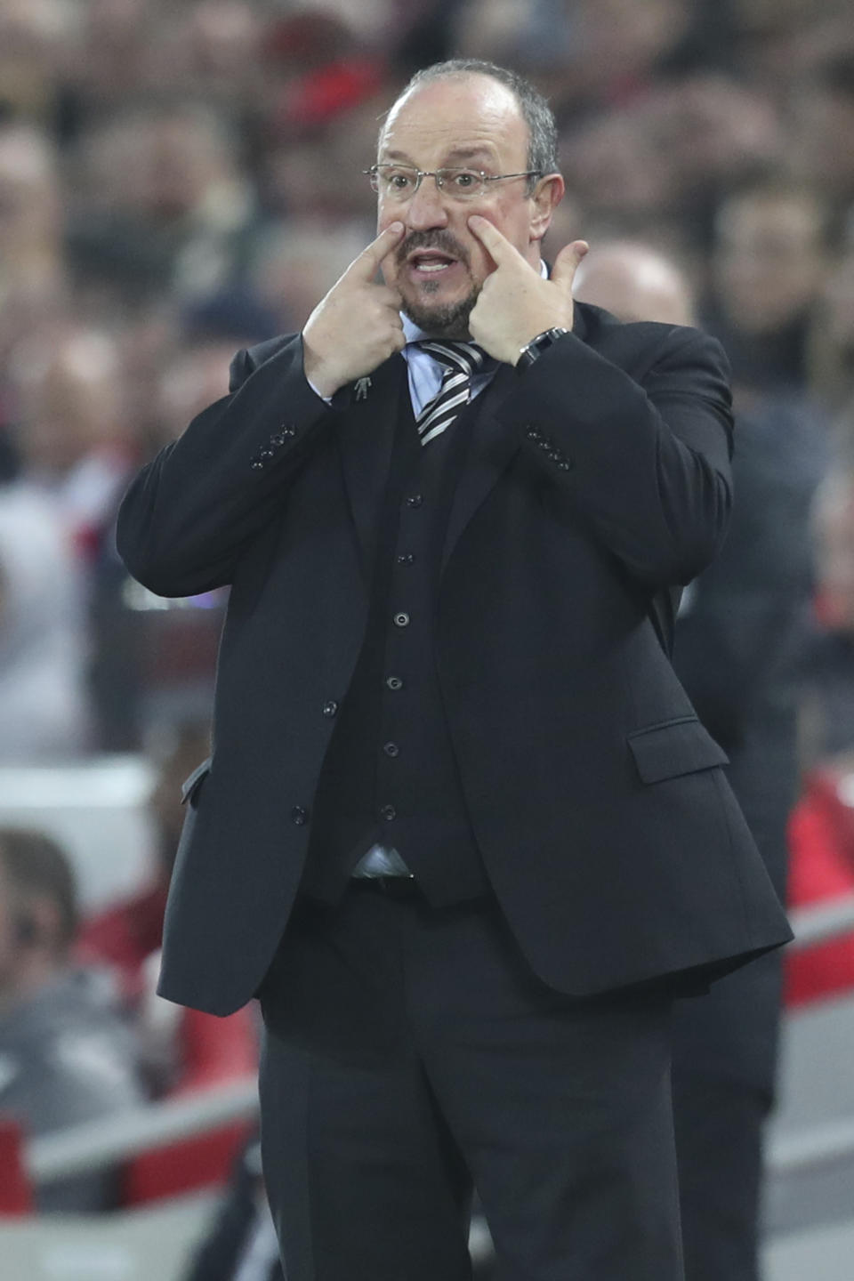 Newcastle coach Rafael Benitez gestures during the English Premier League soccer match between Liverpool and Newcastle at Anfield Stadium, in Liverpool, England, Wednesday, Dec. 26, 2018. (AP Photo/Jon Super)