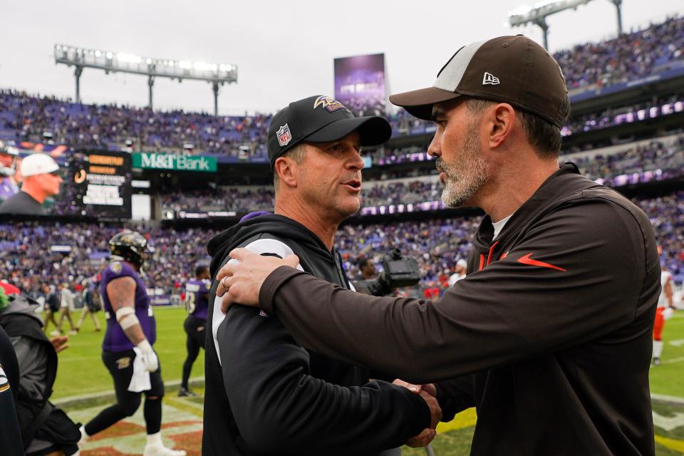 Baltimore Ravens head coach John Harbaugh, left, and Cleveland Browns head coach Kevin Stefanski speak after an NFL football game, Sunday, Oct. 23, 2022, in Baltimore. (AP Photo/Julio Cortez)