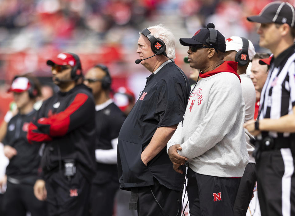 Nebraska offensive coordinator Mark Whipple, left, and associate head coach Mickey Joseph watch from the sideline during the second half of Nebraska's NCAA college football annual red-white spring game at Memorial Stadium in Lincoln, Neb., Saturday, April 9, 2022. The white team defeated the red team 43-39. (AP Photo/Rebecca S. Gratz)