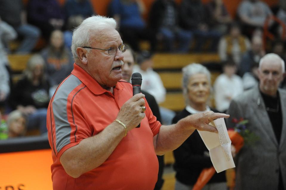 Bob Thompson, former basketball player at Waverly and Ohio State, gives a speech during the dedication of Waverly's Downtown Gym basketball court to his former coach CD Hawhee in a ceremony on Dec. 9, 2023.